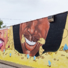 Artist Esan Sommersell Mural Emphasizes The Importance of Generational Wealth and Mental Health